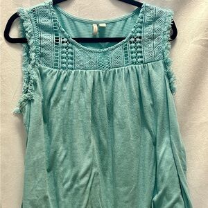 Turquoise sleeveless shirt